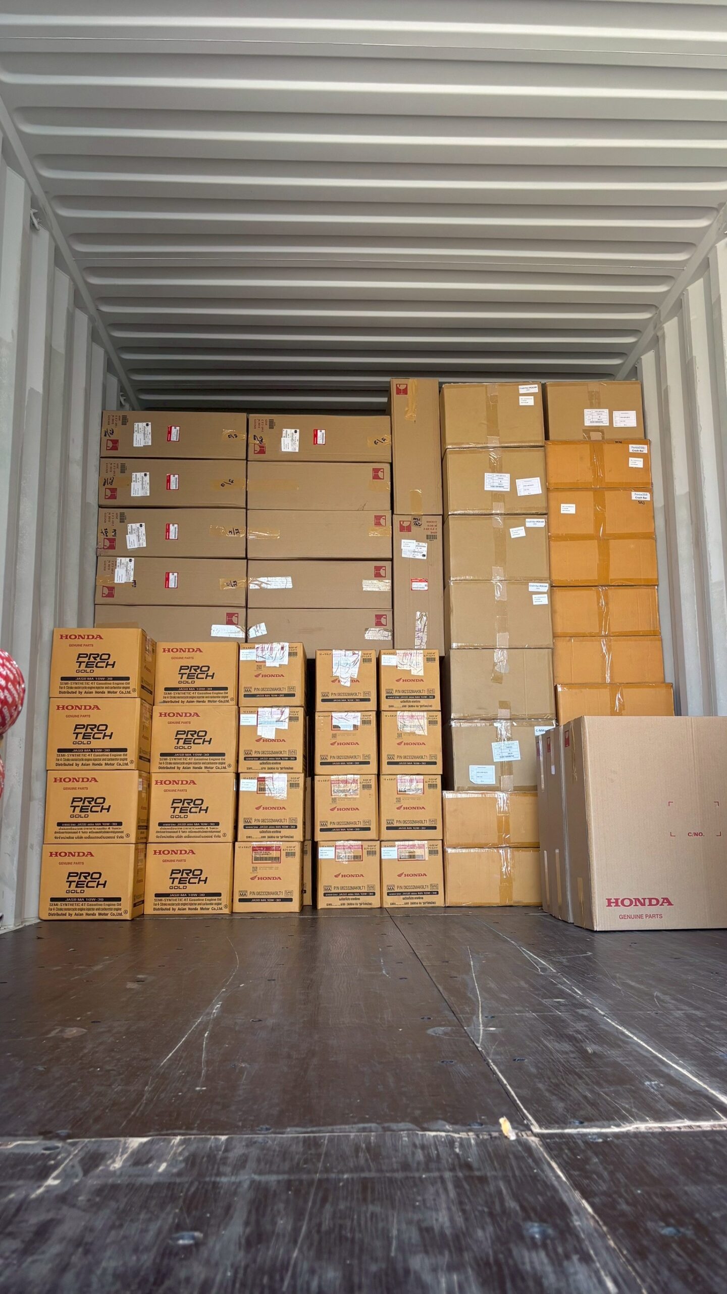 International container shipment of Honda genuine motorcycle parts